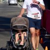 Greg Brant crosses the finish line with daughter Morgan.